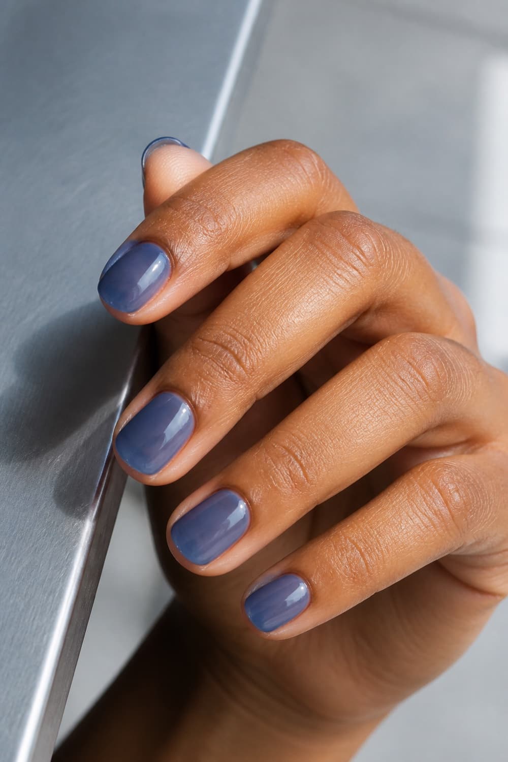 Short denim blue jelly nails with a translucent glossy finish for the first day of school
