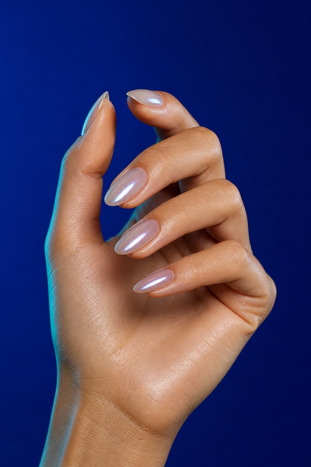 Glazed neutral nail inspo for 2026 on almond-shaped nails