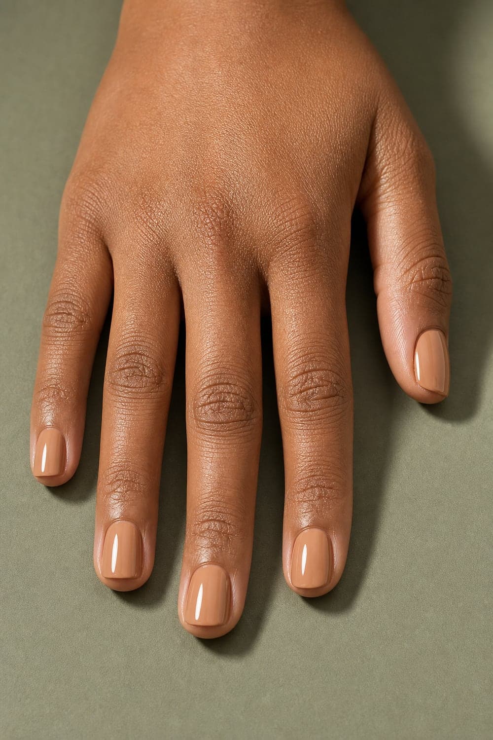 Nude beige nails in minimalist style