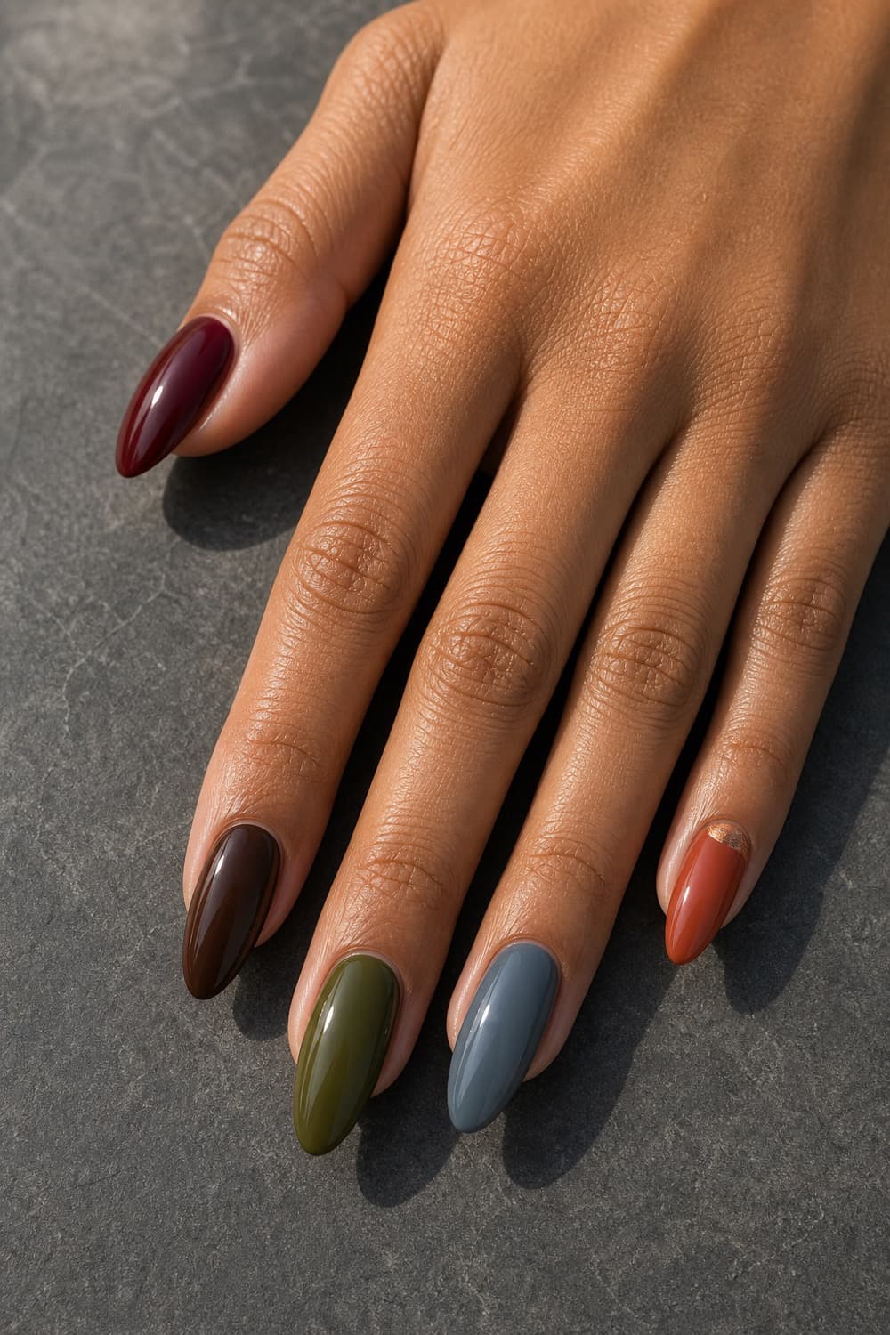 September nail colors in burgundy, chocolate brown, olive green, fog blue, terracotta and bronze chrome