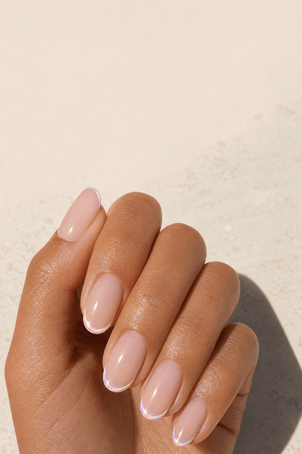 Milky glazed almond nails with fine pearl French tips